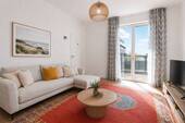 Schlafzimmer mit Zugang zum Balkon - 