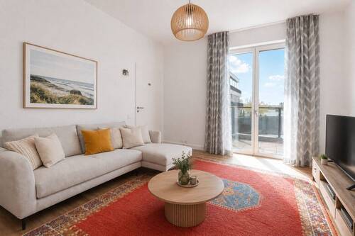 Schlafzimmer mit Zugang zum Balkon - 