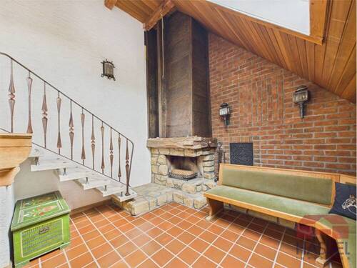 Mit eigenem Kaminbereich - 