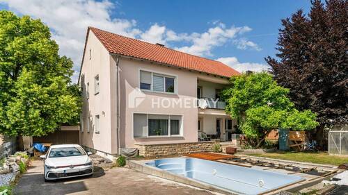 Außenansicht 3 - Familienidyll mit Potenzial: stilvolles Zweifamilienhaus mit Pool und Garten in Ingolstadt