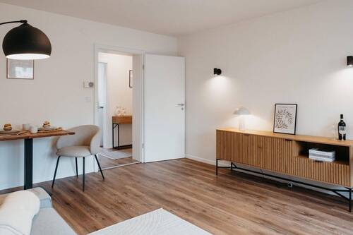 Wohnzimmer Rückseite - Etagenwohnung mit 60,20 m&sup2; in Kaufbeuren zum Kaufen