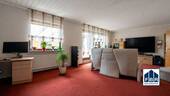 Wohnzimmer mit Zugang zur Terrasse - 