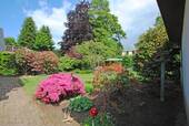 Blühende Garten-Perspektive - Einfamilienhaus mit 127,00 m² in Pinneberg / Quellental zum Kaufen