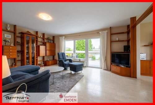 Wohnzimmer mit Zugang zur Terrasse - 