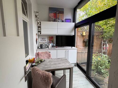 Wintergarten im EG mit Zugang zum Garten - 