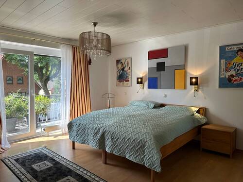 Schlafzimmer mit Balkon - 
