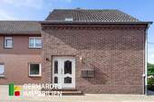 Straßenansicht - Ideal für Zwei - modernisierte Erdgeschosswohnung mit Garten in Boerholz.