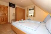 Schlafzimmer 2 im OG - Reihenendhaus mit 66,00 m&sup2; in Butjadingen zum Kaufen