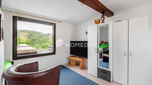 1. OG Schlafzimmer 1 - 