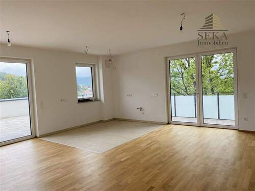 Wohn-/Küchenbereich - Freier Ausblick und große Terrasse - exklusive Wohnung