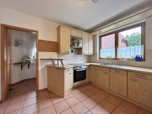 EG Küche mit Speisekammer - Einfamilienhaus mit 157,00 m² in Steyerberg zum Kaufen