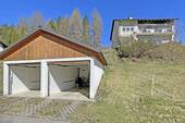 Garage und Hanggrundstück - 