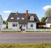 Attraktives Dreiparteienhaus am Feldrand von Eschborn-Niederhöchstadt