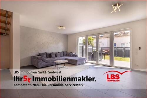Wohnzimmer mit Blick auf die Terrasse - 