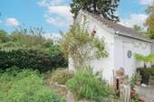Garage mit Sonnensitzecke - 