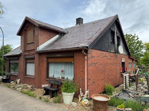 Außenansicht - Lage zum Verlieben, Haus zum Anpacken: Sanierungsobjekt direkt am Kudenseer-Kanal