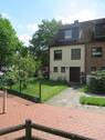 Hausansicht - Reihenendhaus mit 2 Garagen, begehrte Wohnlage in Osterholz …renovieren Sie nach IHREN WÜNSCHEN!
