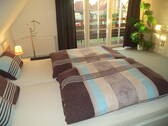 Schlafzimmer 1 Wohnung a - 