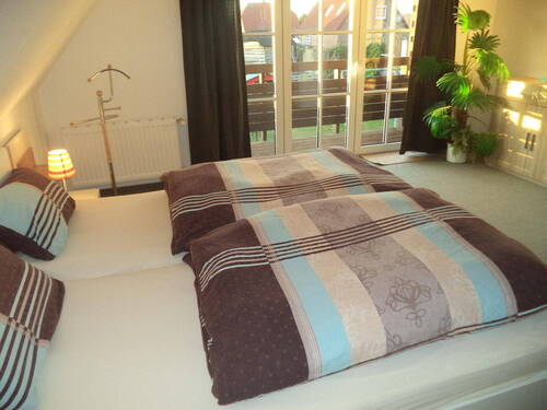 Schlafzimmer 1 Wohnung a - 