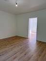 Wohnzimmer mit Balkon - Etagenwohnung mit 50,20 m&sup2; in Ahrensburg zur Miete