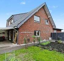 Neuer Preis! Doppelhaushälfte in Geseke-Langeneicke mit Garten, Terrasse sowie Büro und Hobbyraum