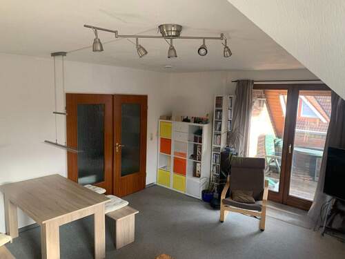 Wohnzimmer (1) - Etagenwohnung mit 62,00 m&sup2; in Westerstede zum Kaufen