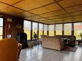 Wohnzimmer mit Kaminofen - 8 Zimmer Einfamilienhaus in Pampow