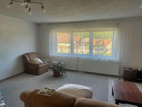 Wohnzimmer - Einfamilienhaus mit 110,00 m&sup2; in Mansfeld zum Kaufen