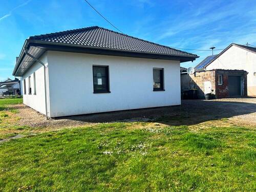 Seitenansicht - 4 Zimmer Einfamilienhaus zum Kaufen in Hasselbach