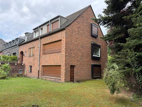 Seitenansicht - Mehrfamilienhaus, Wohnhaus mit 199,70 m² in Krefeld zum Kaufen