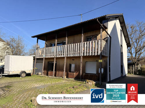 Bild 1 - Solides Einfamilienhaus in ruhiger Wohnlage von Nauroth!