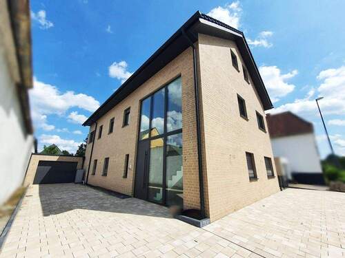 Seitenansicht - 6 Zimmer Mehrfamilienhaus, Wohnhaus zum Kaufen in Gütersloh