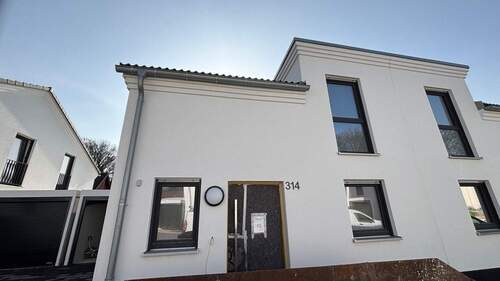 Vorderansicht - Doppelhaushälfte mit 137,80 m&sup2; in Duisburg zum Kaufen