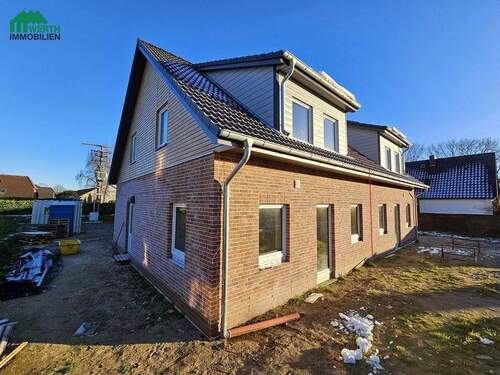 Nord-Westseite - 1 Zimmer Doppelhaushälfte in Oster-Ohrstedt