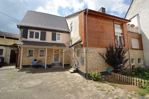 Häuseransicht - Mehrfamilienhaus, Wohnhaus mit 244,20 m&sup2; in Klein-Winternheim zum Kaufen