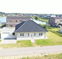 Neubau-Bungalow (KfW40) nebst massiver Garage in Herzlake in direkter Seenähe!