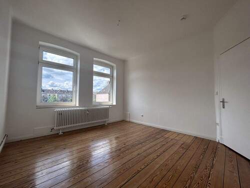 Wohnzimmer - Etagenwohnung mit 66,00 m² in Neumünster zum Kaufen