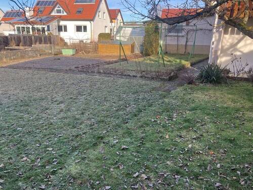 Garten mit Gewächshaus - 