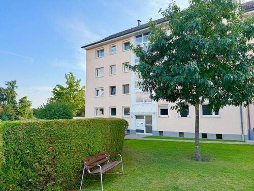 Hausansicht - Etagenwohnung mit 75,00 m² in Oberasbach zum Kaufen