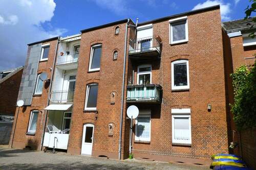 Haus Rückfassade - 3 Zimmer Etagenwohnung in Rendsburg