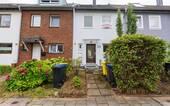 Hausansicht - Harmonisches Wohnen: Gepflegtes Reihenmittelhaus mit komfortablen Garten in ruhiger Lage