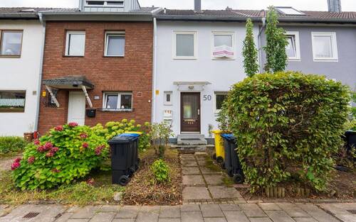 Hausansicht - Harmonisches Wohnen: Gepflegtes Reihenmittelhaus mit komfortablen Garten in ruhiger Lage