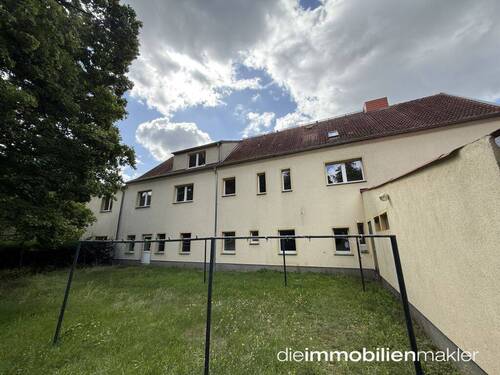 Hausansicht von hinten - Mehrfamilienhaus, Wohnhaus mit 539,00 m&sup2; in Kasel-Golzig zum Kaufen