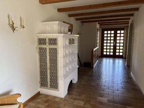 Diele mit Kachelofen - 