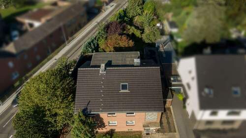 Hausansicht - 1 Zimmer Mehrfamilienhaus, Wohnhaus zum Kaufen in Rommerskirchen