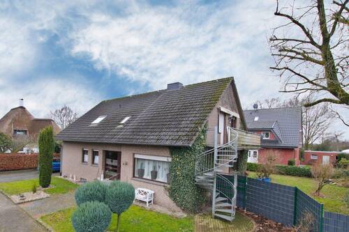 Straßenansicht rechts - Flexibles Wohnen - EFH oder ZFH mit Garten, Garage & Vollkeller