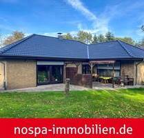 Gepflegter Winkelbungalow mit Südwest-Terrasse und massiver Garage in Drelsdorf