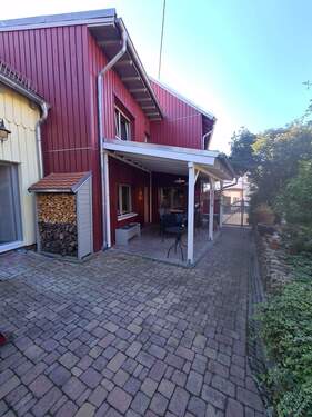 überdachte Terrasse am Haupthaus - 