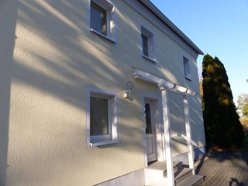 Hauseingang - Einfamilienhaus mit 100,00 m² in Liebschützberg zum Kaufen
