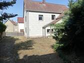 Ansicht von de Hofseite - Einfamilienhaus mit 137,00 m² in Cavertitz OT Schirmenitz zum Kaufen